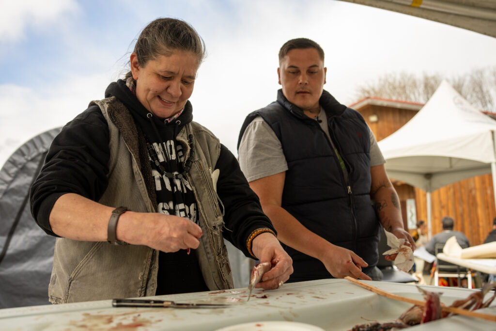 Hesquiaht First Nation member Hasiikwaayak (Josh Charleson) taught participants the traditional method to prepare and smoke herring.
