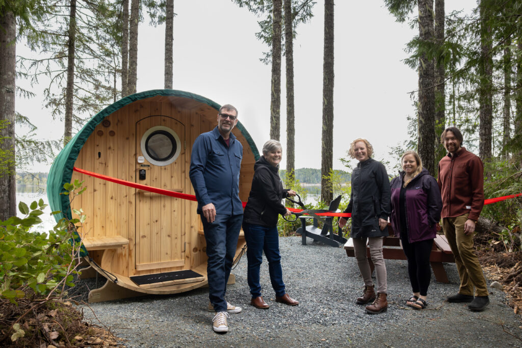 Hon Josie Osborne, MLA for Mid Island-Pacific Rim, and Vickey Brown, Mayor of Cumberland and Island Coastal Economic Trust Board Member, cut the ribbon during the grand opening at Cumberland Lake Park