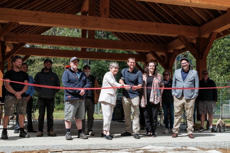 Grand opening at the Beaver Creek Pavilion highlights MLA Josie Osborne and Island Coastal Trust's Vice Chair John Jack at the ribbon cutting ceremony.